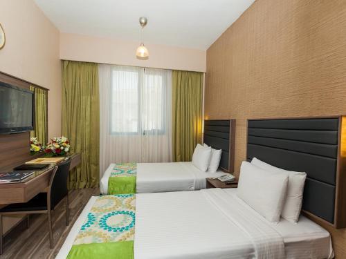 Oasis Deira Hotel Dubai Exterior foto